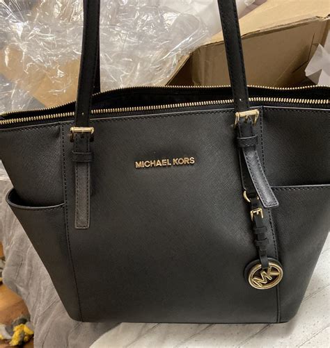 michael kors 双拉链包衬里|Michael Kors jewelry repair.